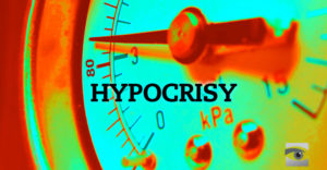 A dial showing hypocrisy climbing.