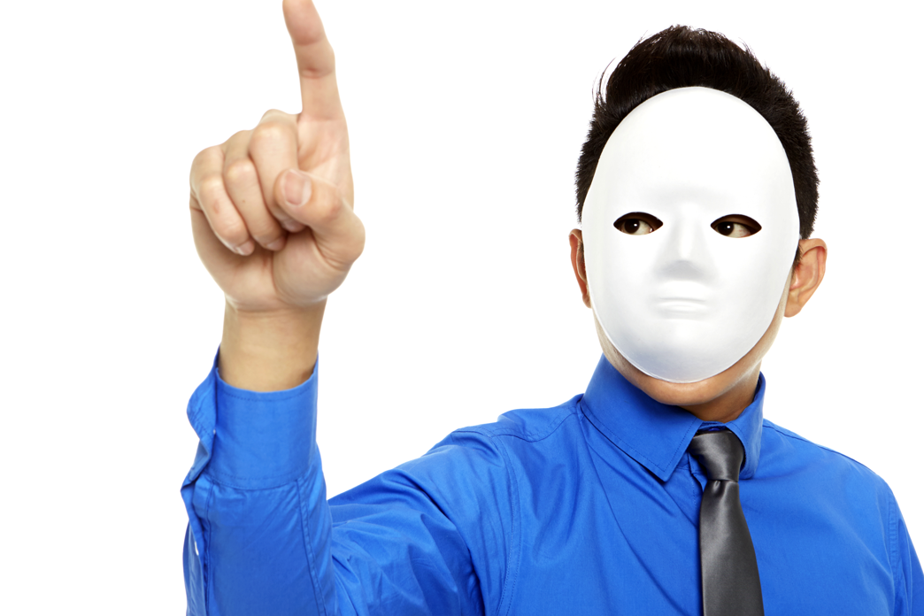 A man in a dress shirt and tie wears a white featureless mask.